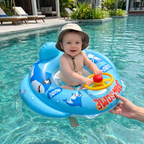 Inflatable baby swim ring with seat and steering wheel in a shark design
